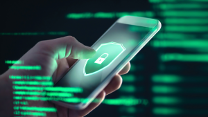 Man holding phone with green lock, showing phone tracking threat.